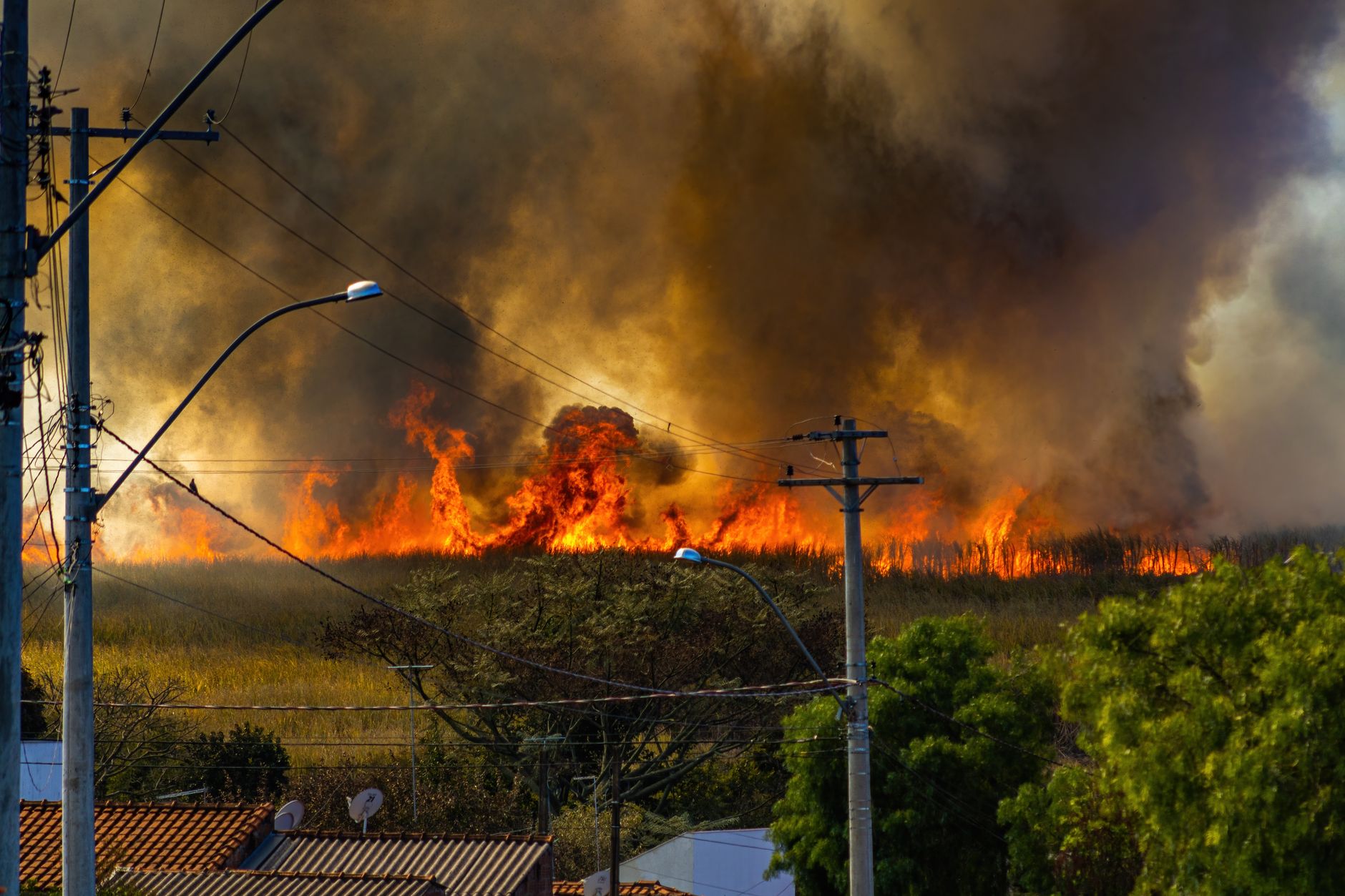 Trump renews wildfire tariff threat against Canada after sitting with PM Carney at World Cup
