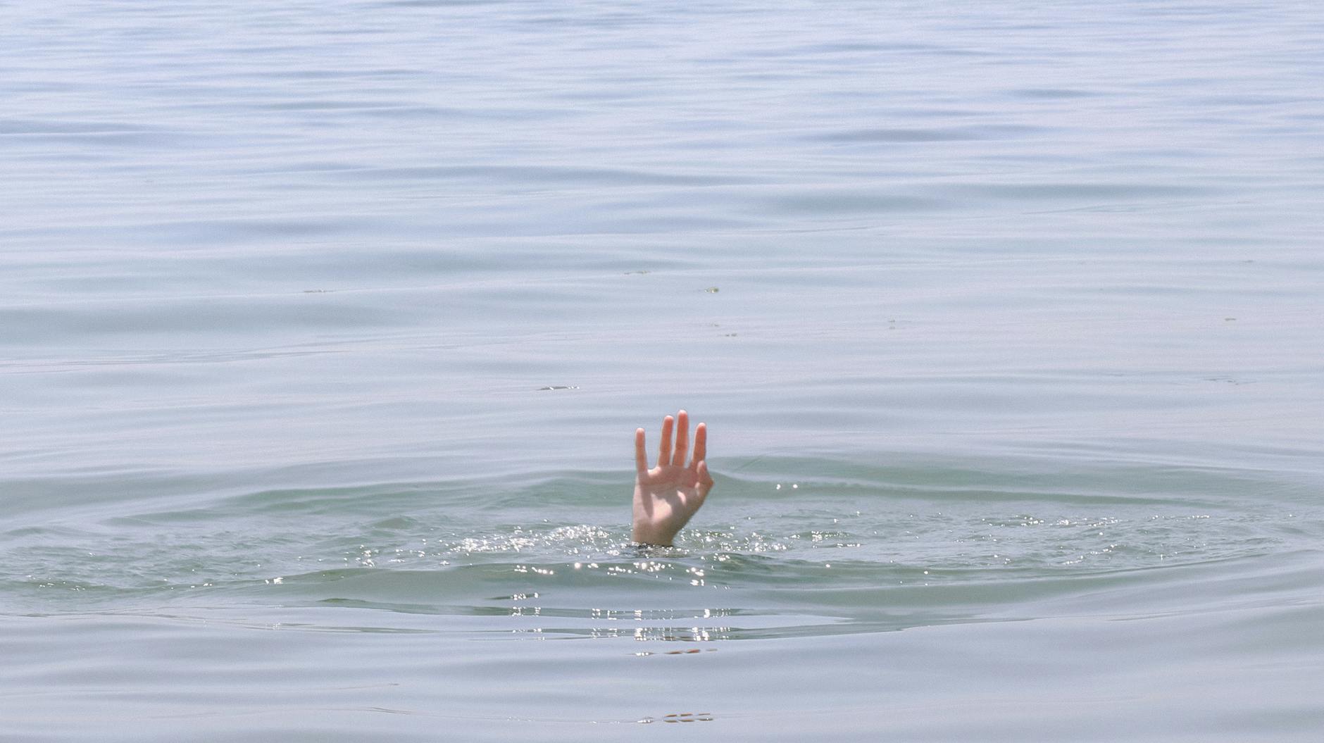 One rescued, one presumed drowned near Cherry Beach