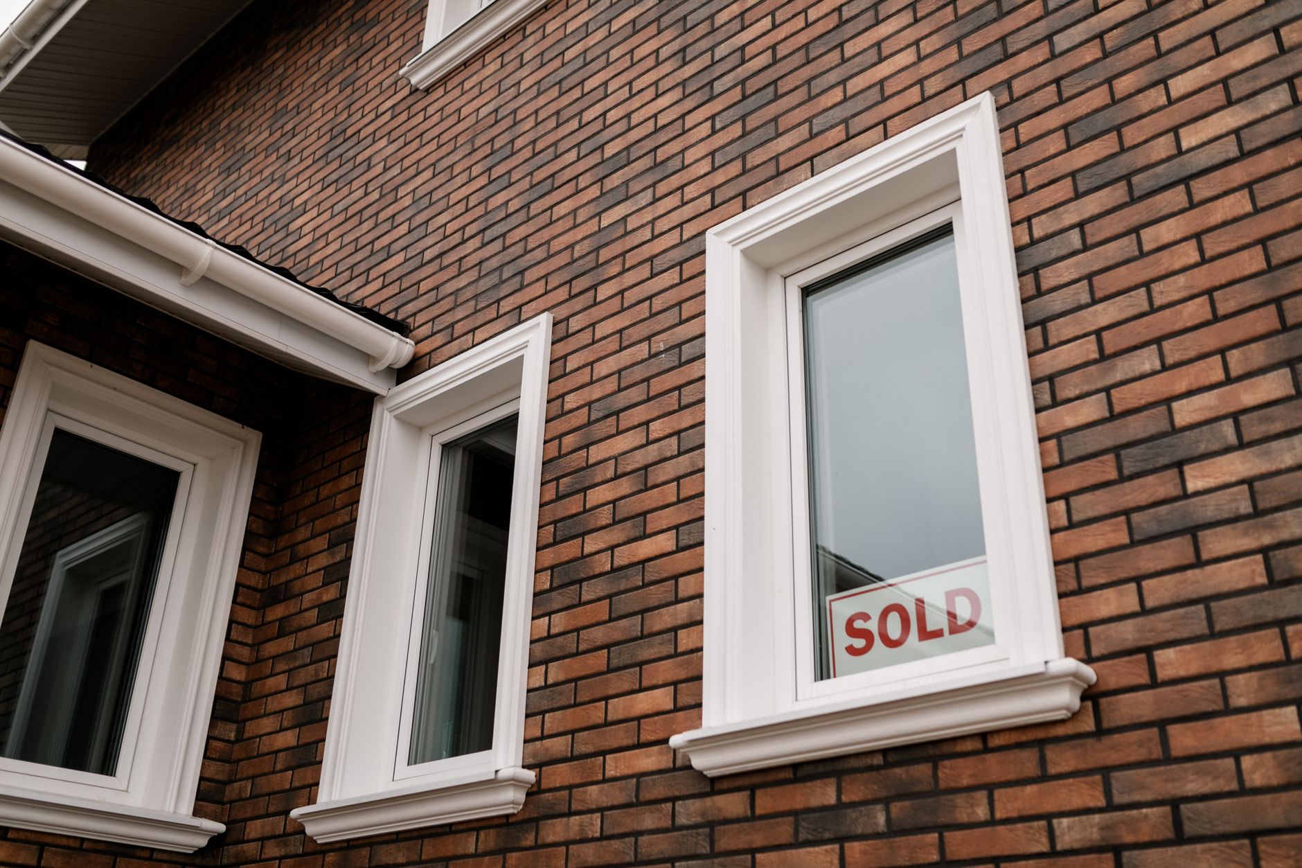 Home sales dip but momentum builds heading into summer