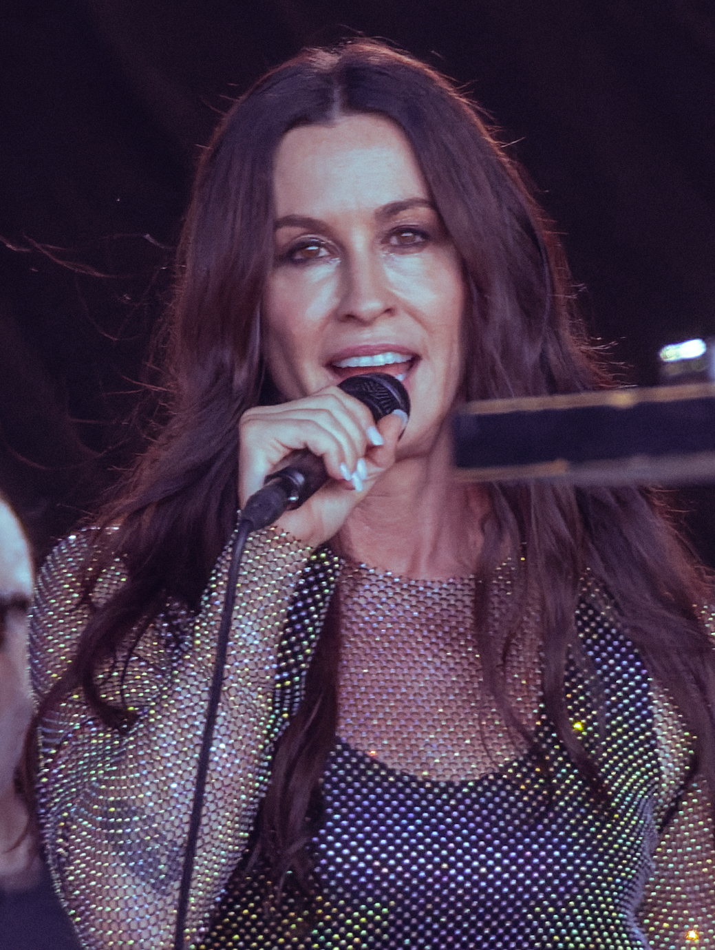 Alanis Morissette smiles through decades of anger at Saturday Saddledome show