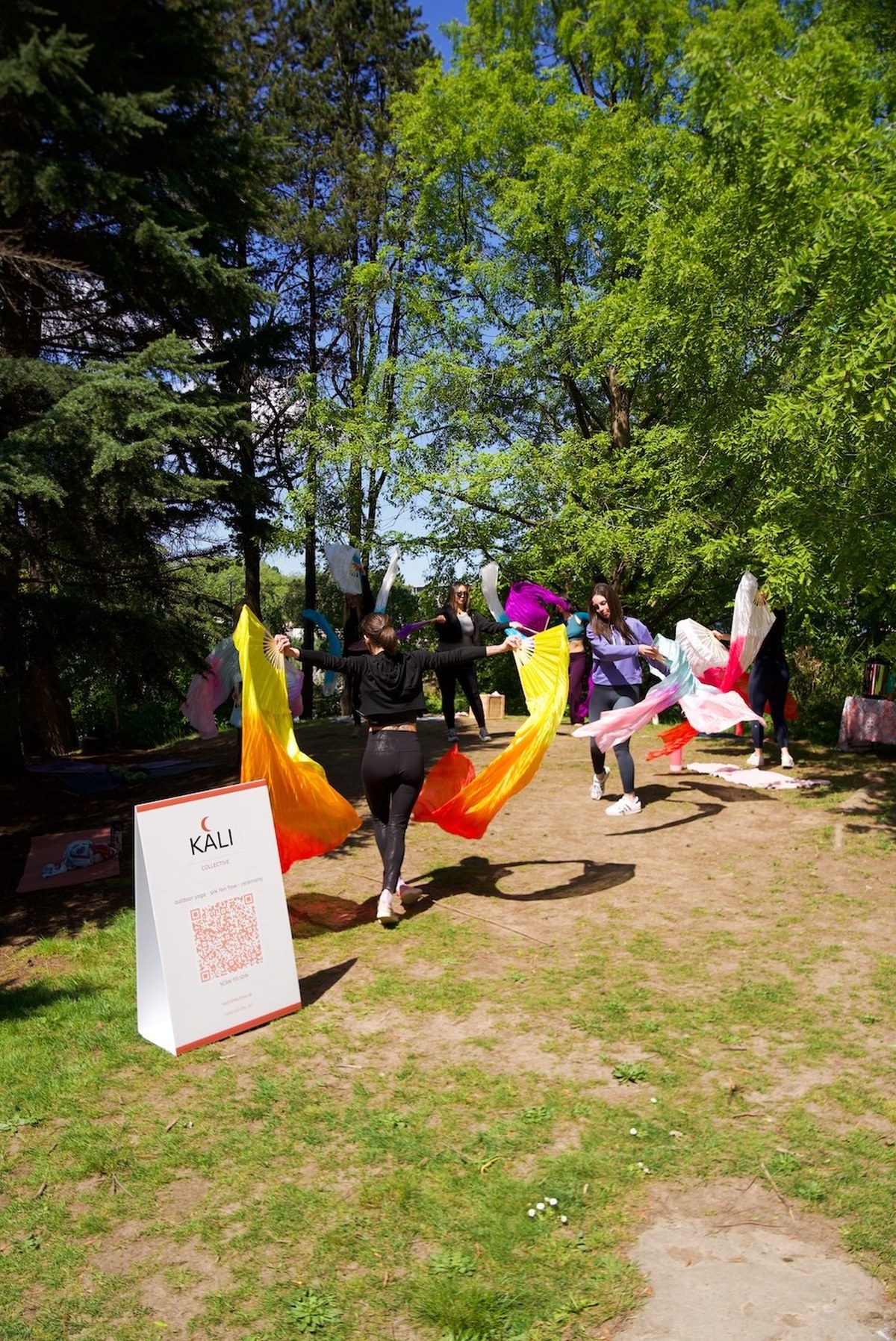 Silk fan flow meets yoga at sunset in Charleson Park