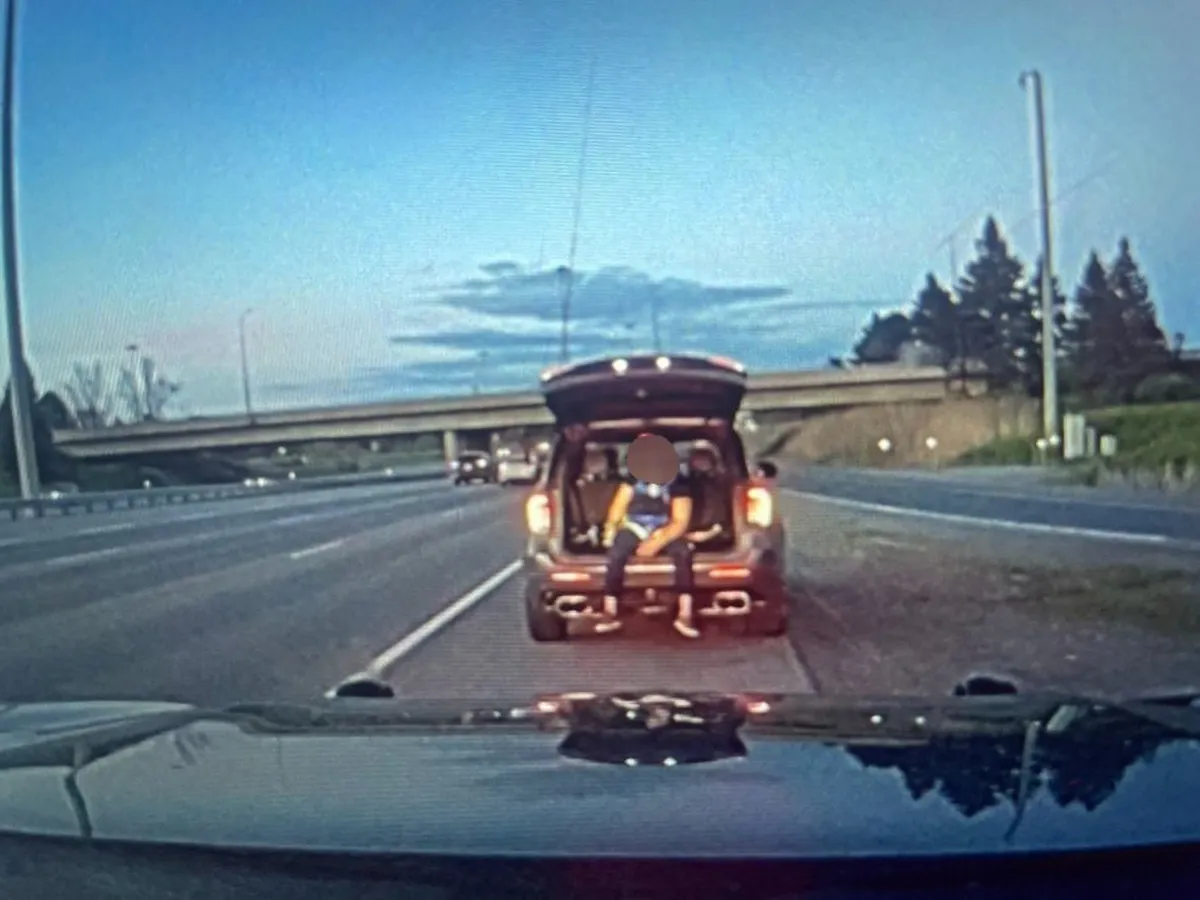 Driver charged with stunt driving after passenger rode in open truck bed
