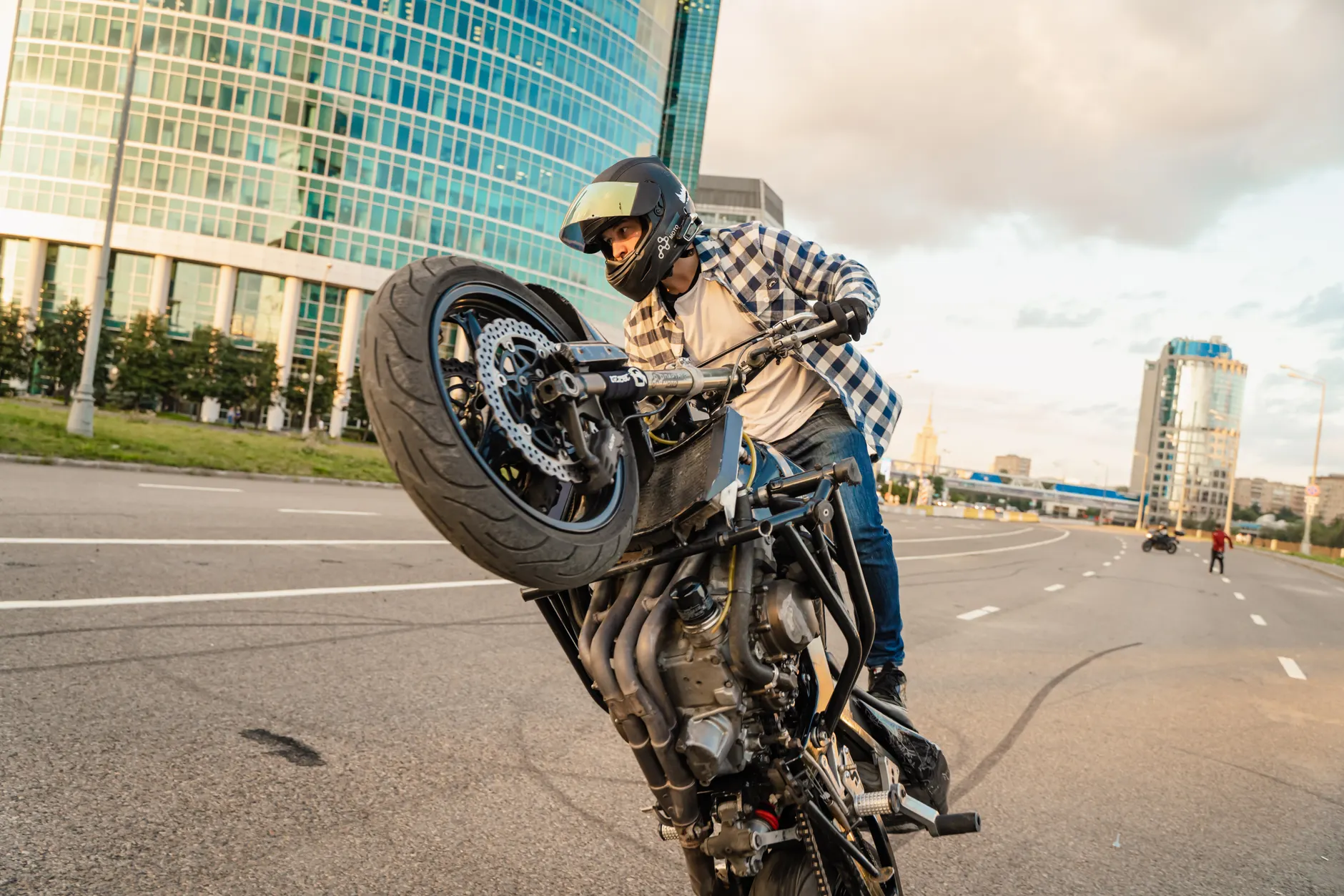 Stunt motorcyclist faces charges after posting wheelies online to provoke police