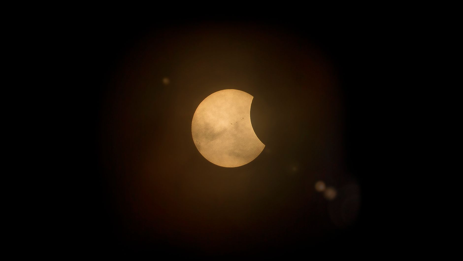Partial solar eclipse visible across Alberta on Wednesday morning