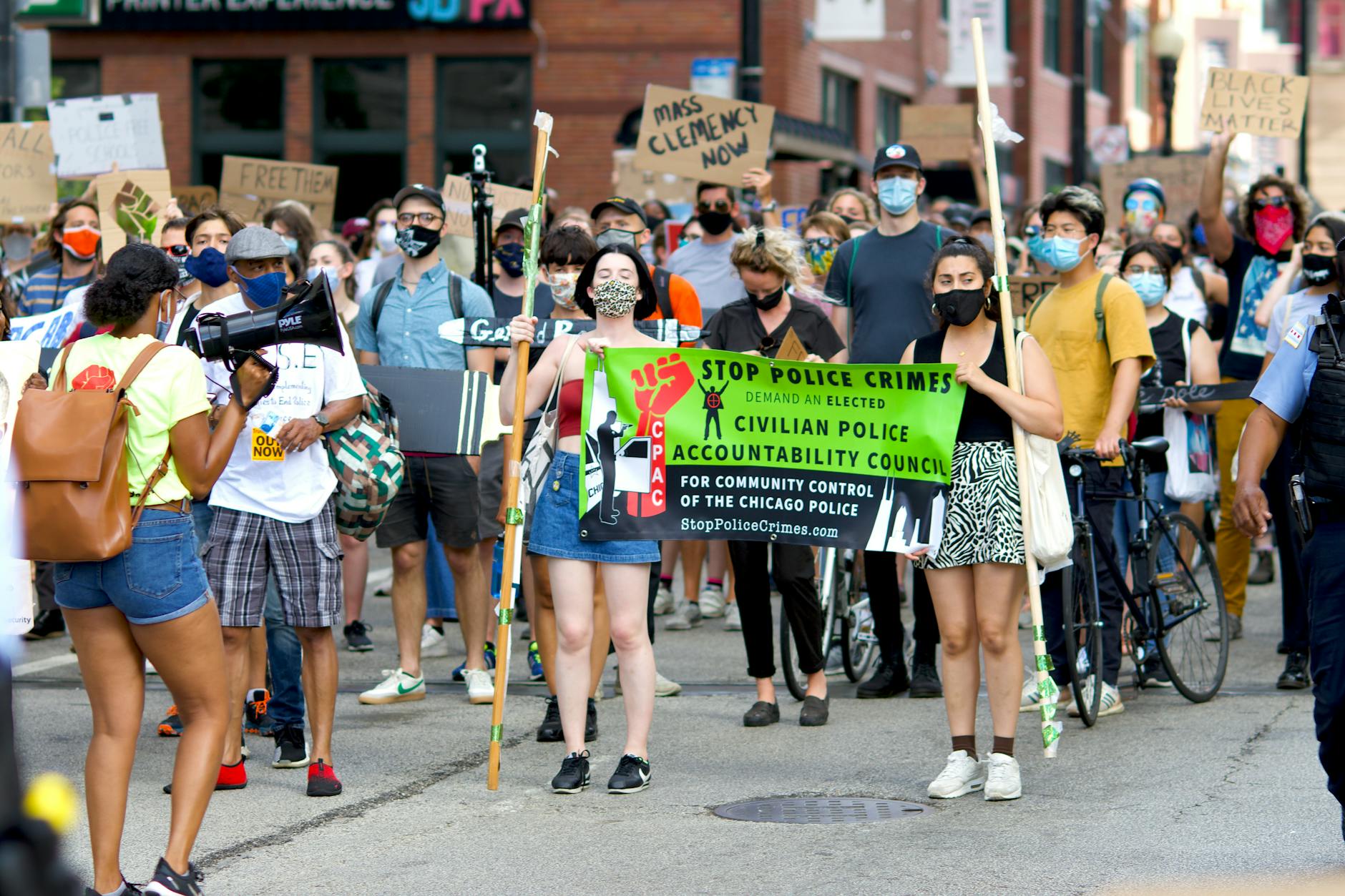 Thousands march downtown against UCP policies