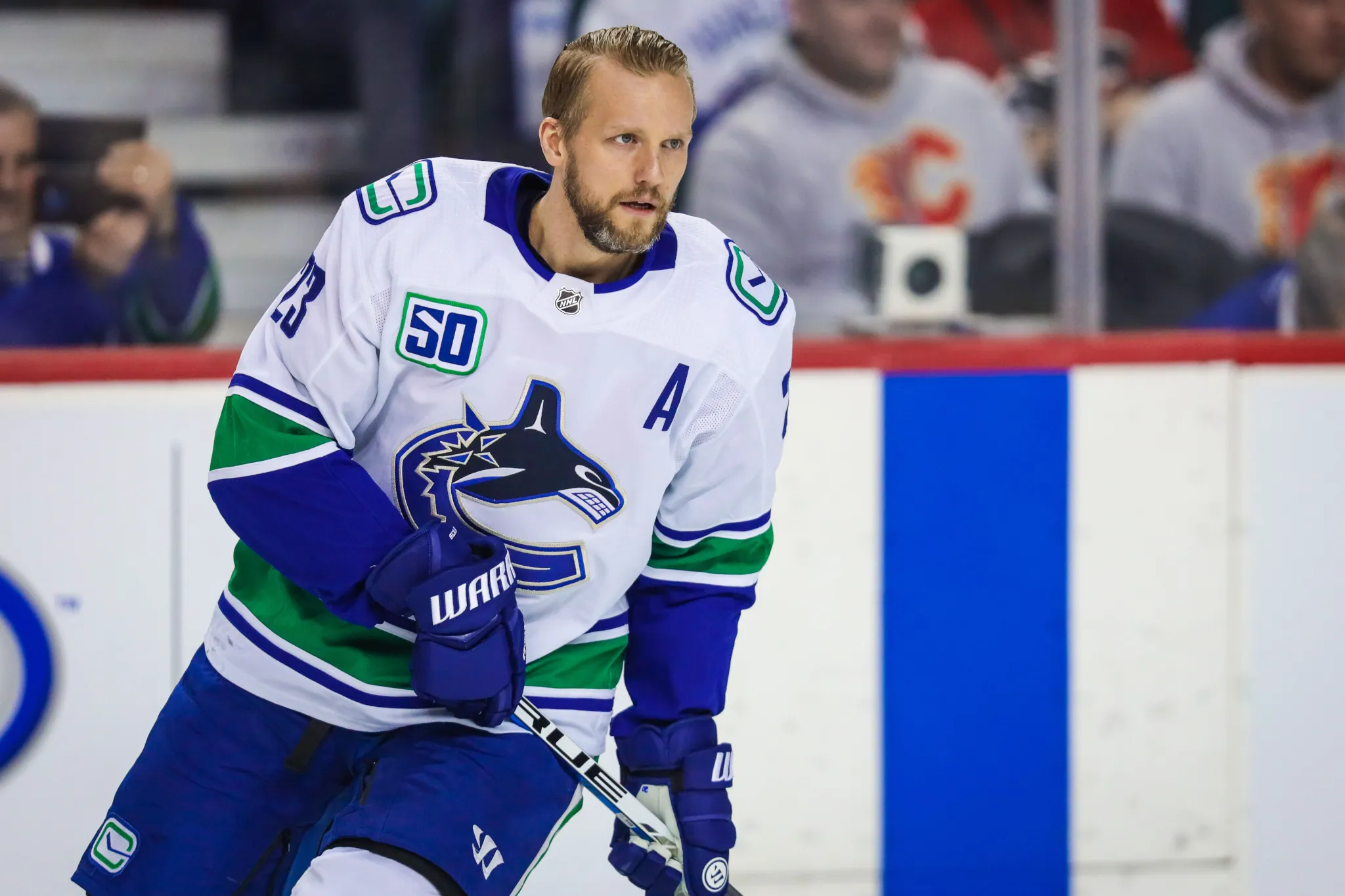 Canucks add Edler to Sedin-led staff